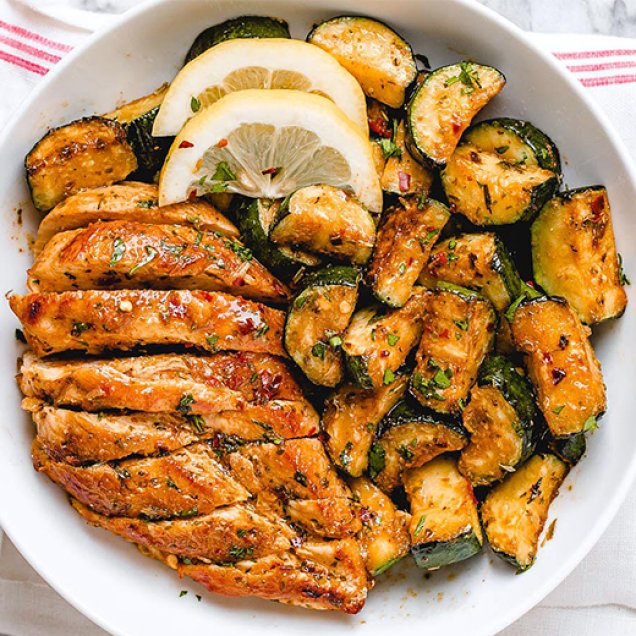 Forget dry chicken with our delicious Asado chicken breast recipe! Boneless chicken breasts are deliciously marinated before being grilled until tender and served with sauteed lemon zucchini. 